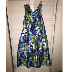 Gorgeous peacock colored dress.